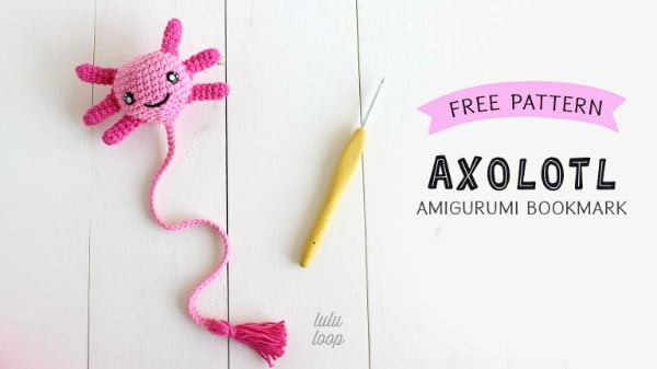 Pink crochet axolotl bookmark.