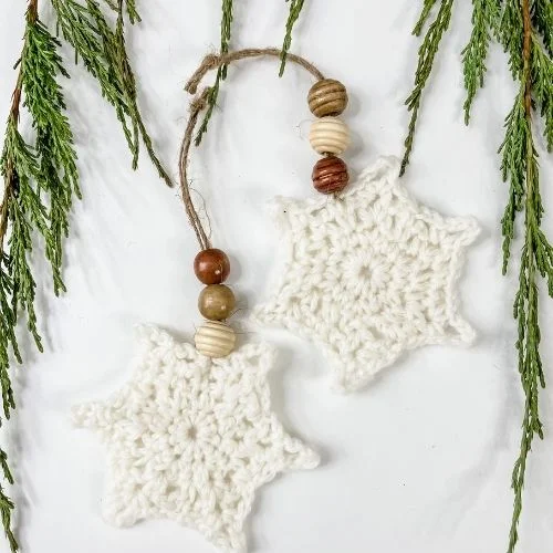 Snowflake Christmas tree ornaments with wooden beads.