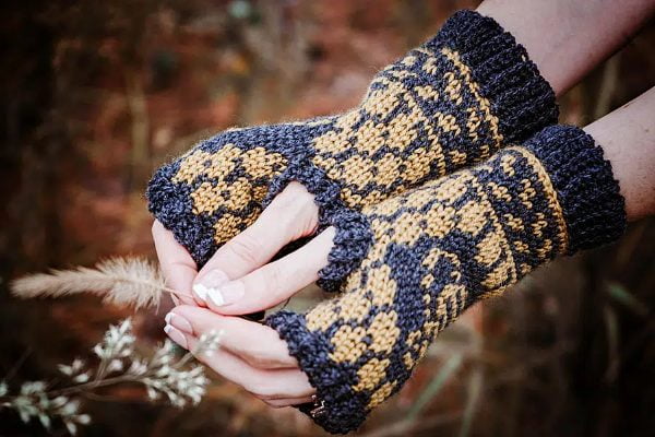 Fair Isle crochet mittens with bee design.