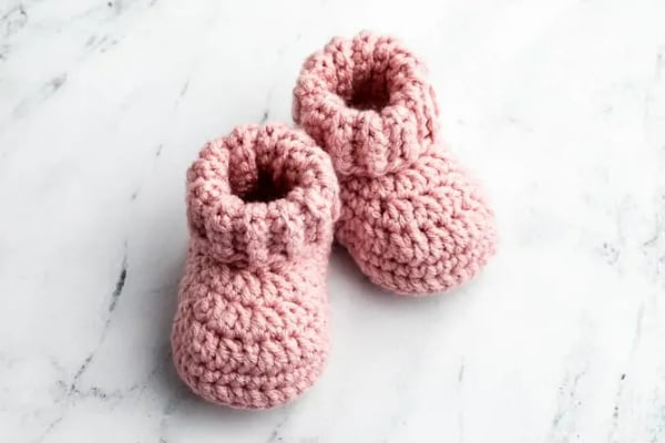 Classic crocheted baby booties.