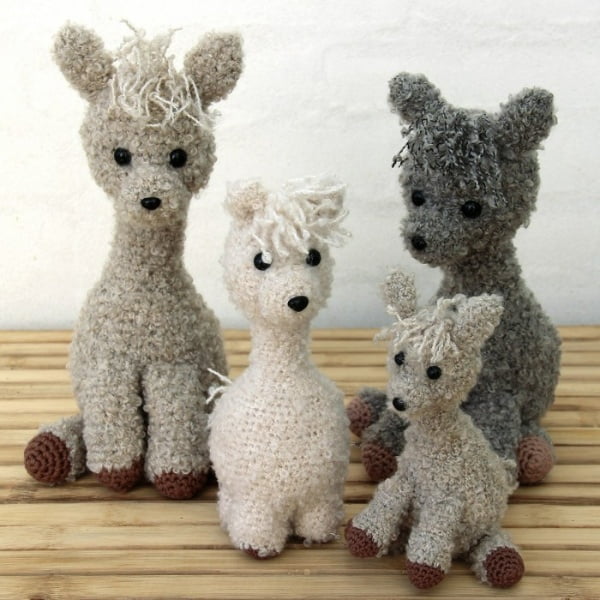 A family of crochet alpacas.