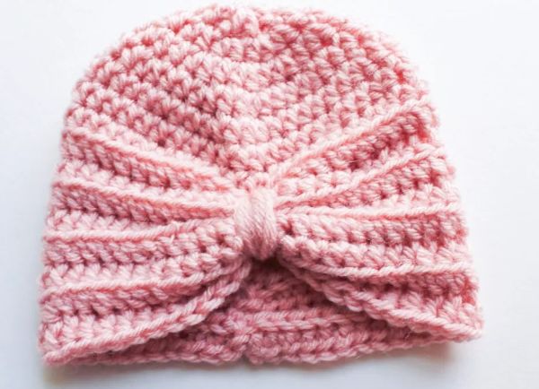 Crocheted turban for a baby girl.