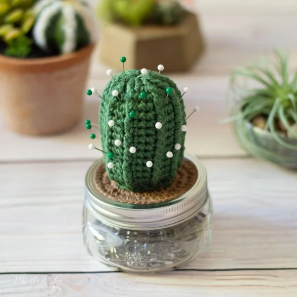 Cactus-shaped crochet pin cushion.