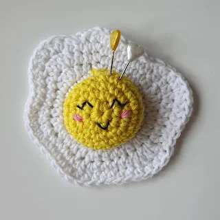 Fried egg crochet pincushion.