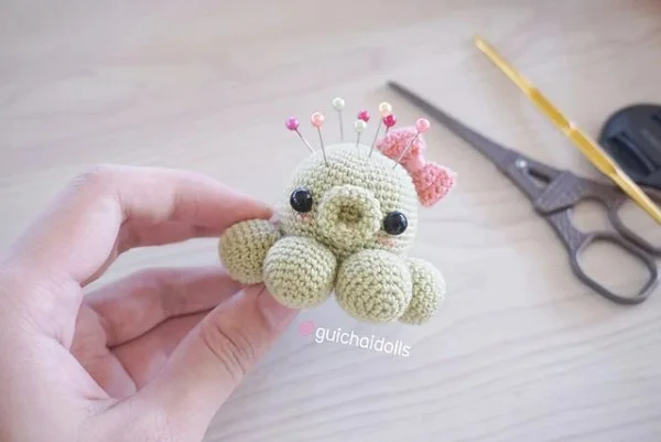 Crochet octopus pincushion.