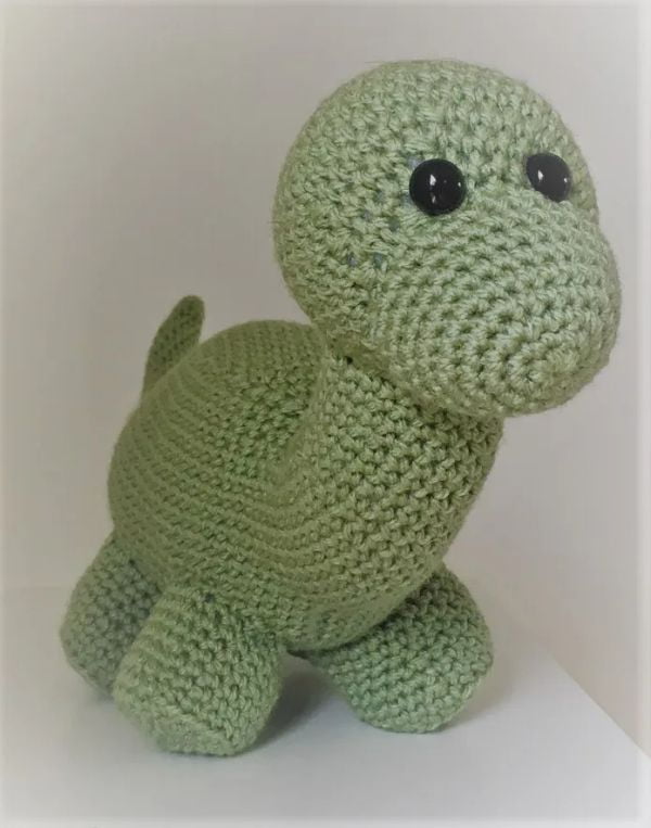 Green crochet Brontosaurs dinosaur.