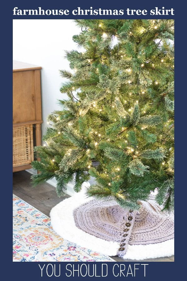 Christmas tree with lights on a crocheted Christmas tree skirt with wide faux fur trim.