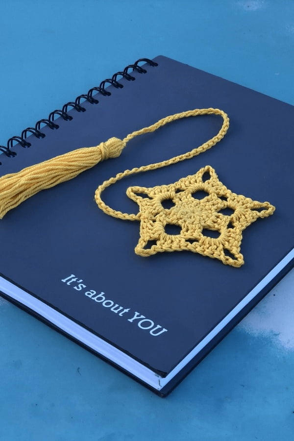 Crochet star bookmark with tassel.