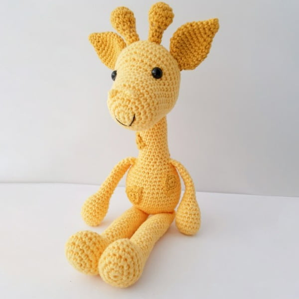 All yellow crochet giraffe.