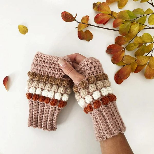 Fingerless crochet gloves with bobble stitch.