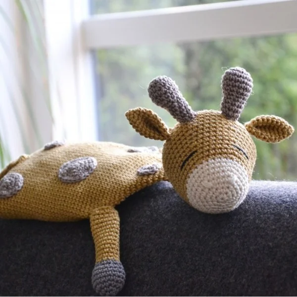 Crochet giraffe baby lovey.