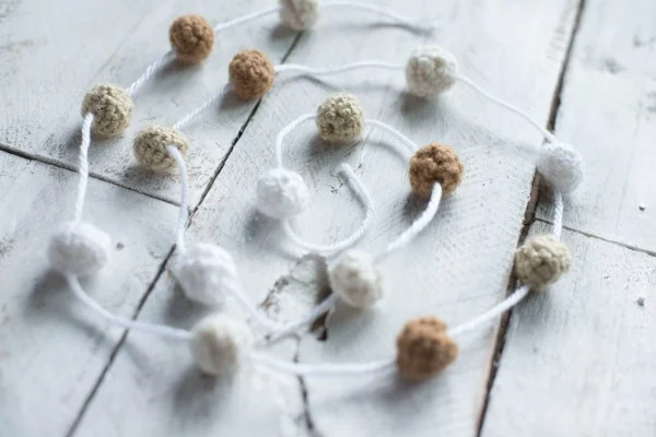 Simple crocheted Christmas garland with little balls.