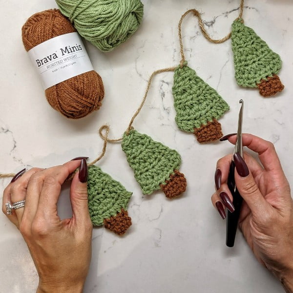 Crocheted mini Christmas tree garland.
