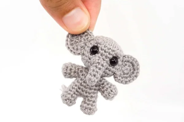 Tiny crocheted elephant.