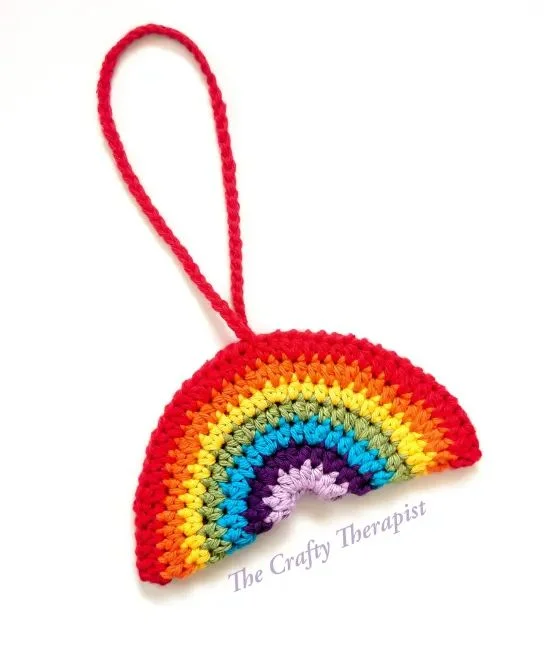 Crochet rainbow ornament.