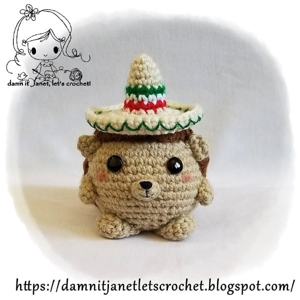 Crochet hedgehog with sombrero.