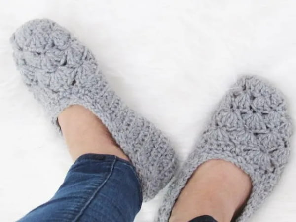 Gray shell stitch crochet slippers.