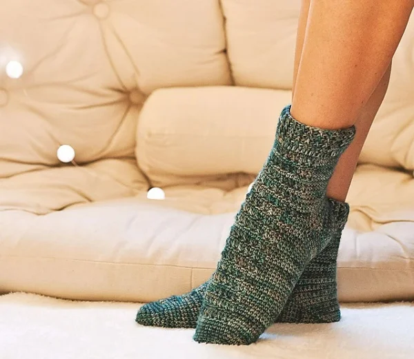 Green crochet socks with ribbed cuff.