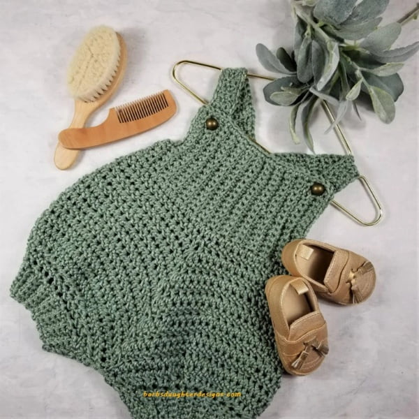 Crochet baby romper with rib stitch design.