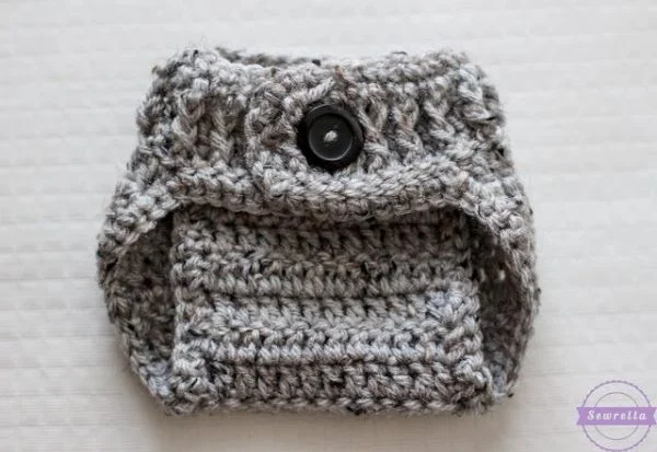 Grey crochet diaper cover.