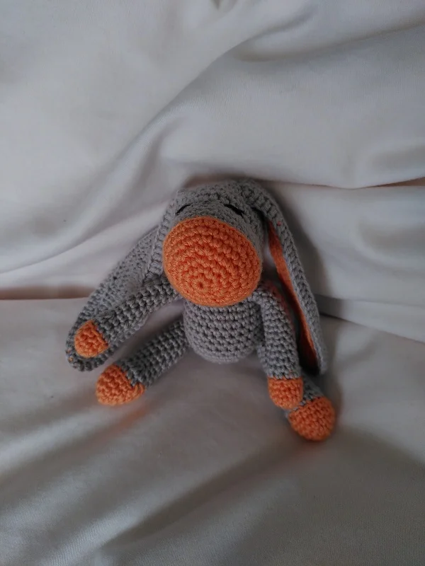 Gray and orange crochet donley.