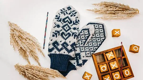 Crocheted mittens featuring traditional Fair Isle colorwork.