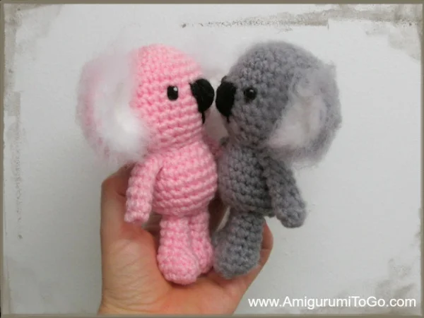 Two crochet koalas with furry ears.