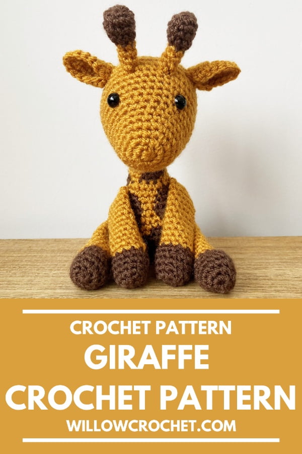 Sitting crochet giraffe.