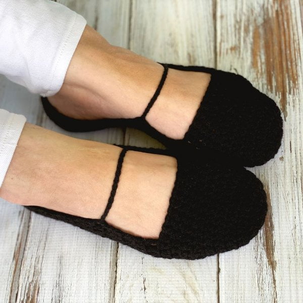 black ballerina-style crochet slippers