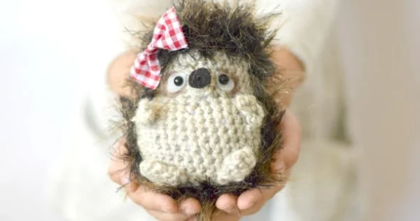 Crochet hedgehog with a bow