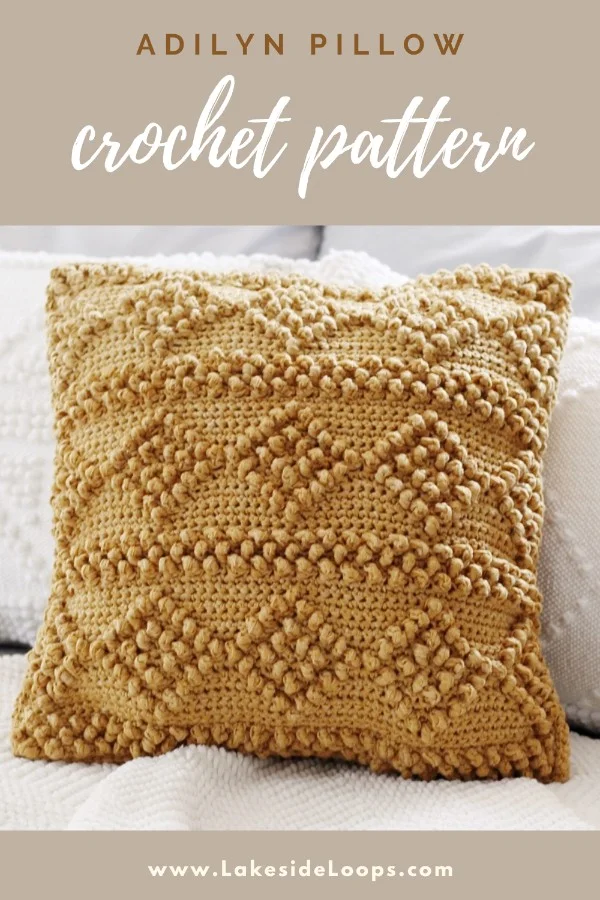 Yellow crochet cushion.