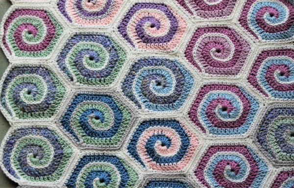Crochet spiral motifs joined to make a blanket.