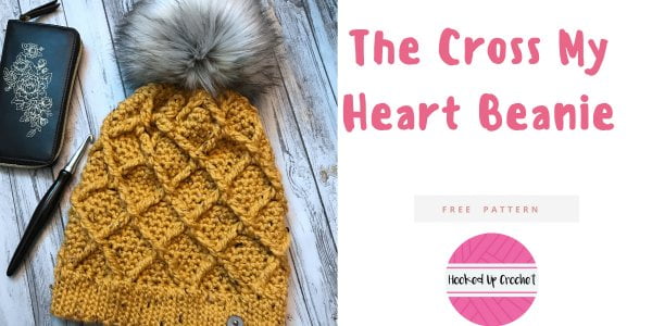 A yeloow cable crochet hat.