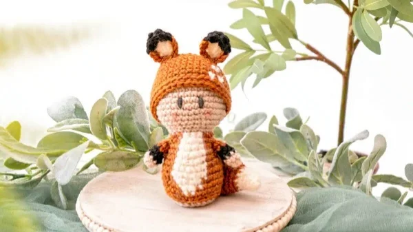 Crochet fox in a hat.