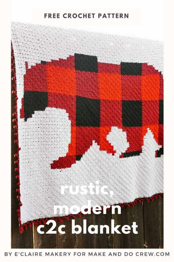 A c2c crochet blanket with the image of a bear crocheted in red plaid.