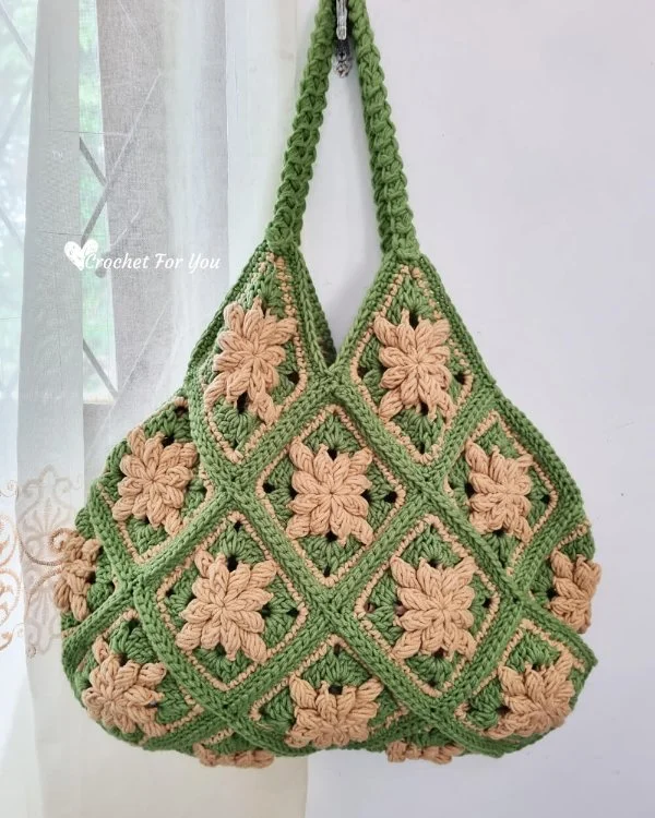 Vintage-look green and tan crochet bag.