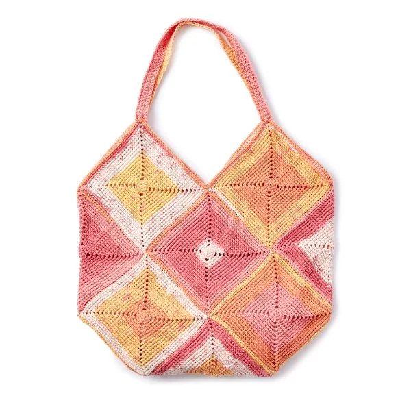 Crochet granny square bag in yellows, pinks, and oranges.