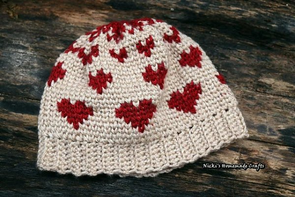 Tapestry crochet beanie with love heart pattern.