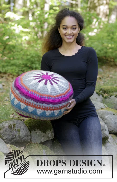 Brightly coloured tapestry crochet pouffe.