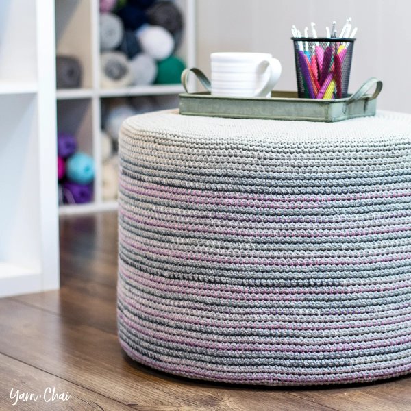 Grey and pink tones mosaic crochet pouf.