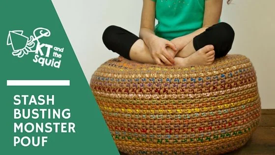 Cross-legged child sitting on a crochet pouf.