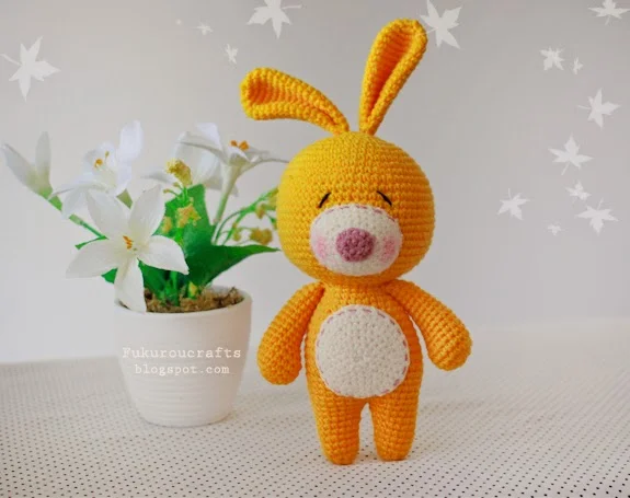 Yellow crochet rabbit.