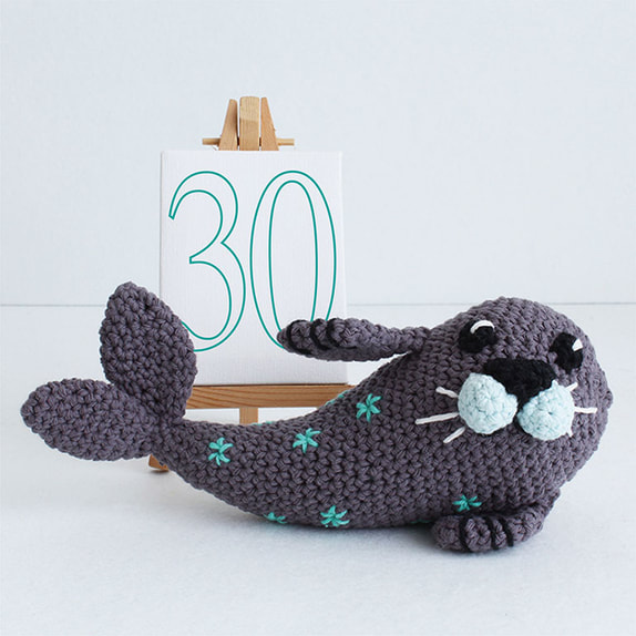 A crochet seal toy.