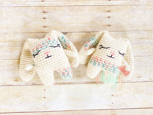 Two minimal crochet rabbits.