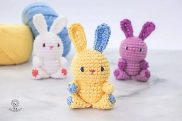 three colourful crochet rabbit amigurumi.