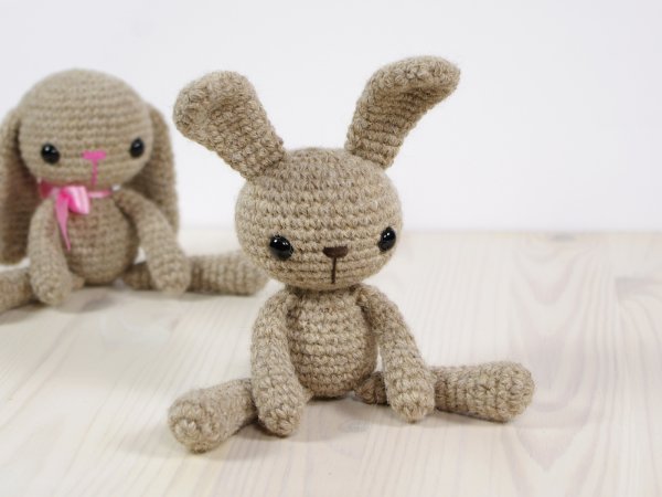 A crochet bunny with long legs.