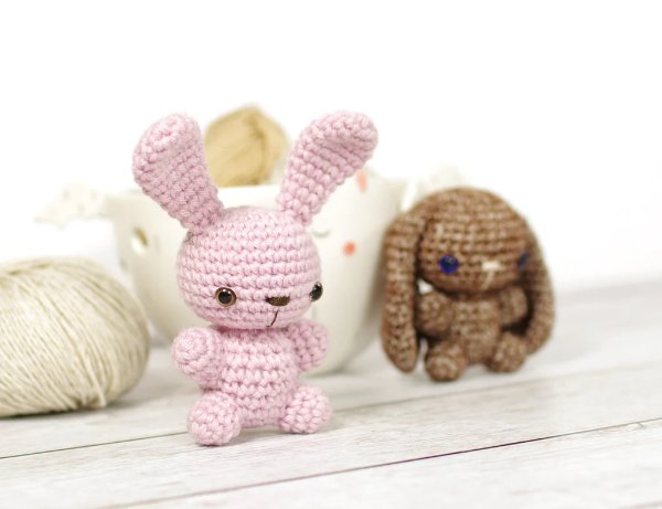 Two little crochet rabbit stuffies.