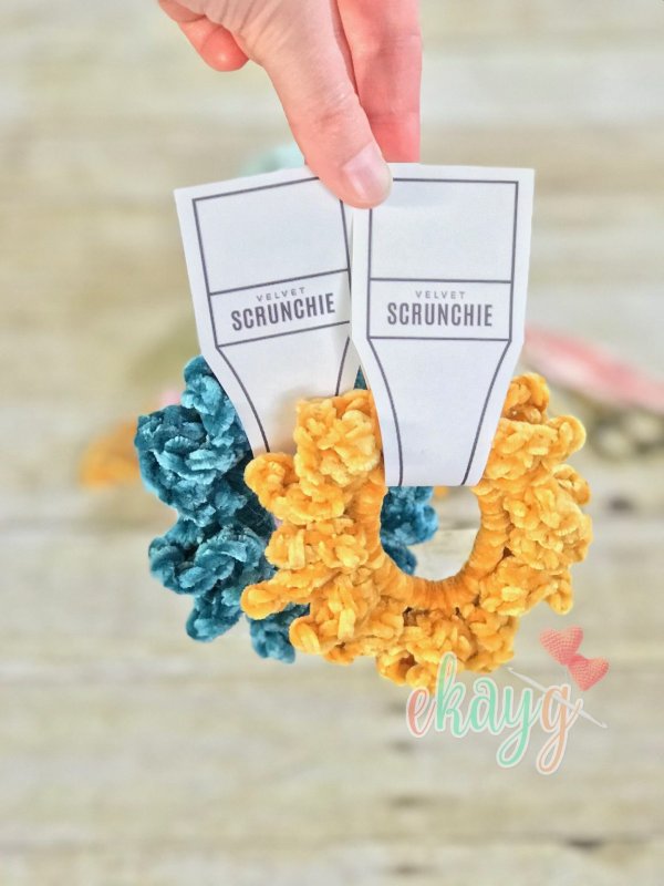 Bright yellow and blue crochet scrunchies.