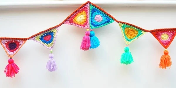 A brighty coloured granny stitch crochet bunting.
