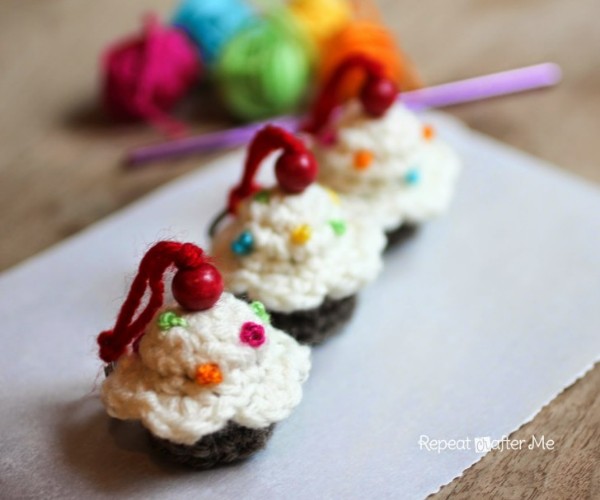 Three miniautre crochet cupcake keychains.